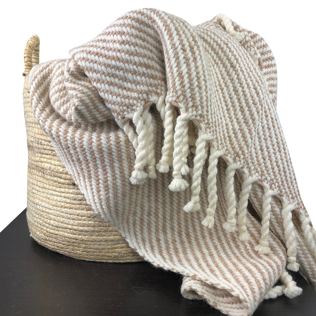 Royal Knit Peru 75% alpaca striped throw blanket styled in cozy living room setting