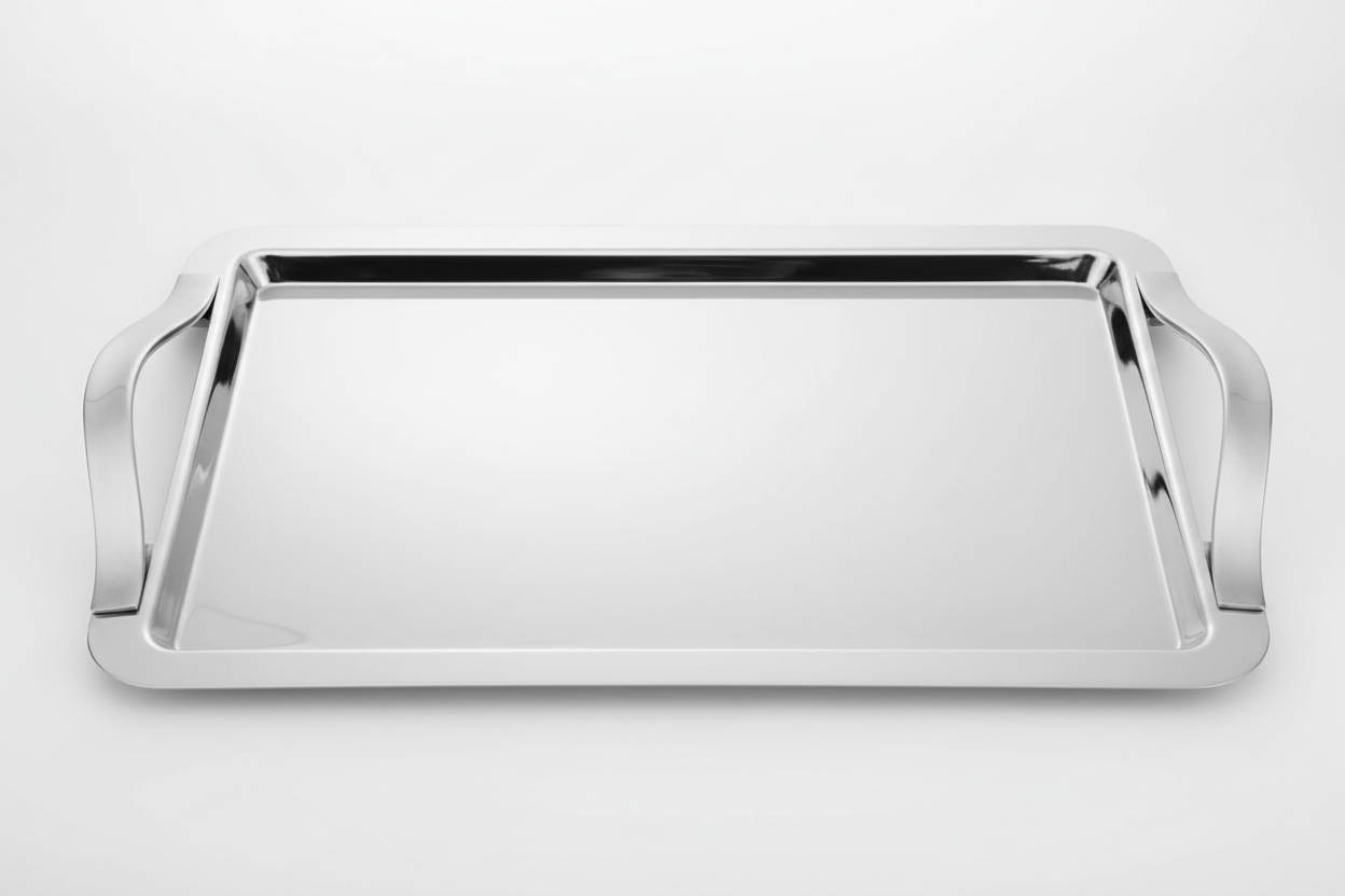 Close-up detail of Degrenne Newport serving tray showing mirror finish and elegant ergonomic handles